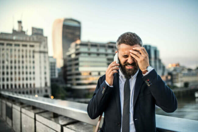 Frustrated Man that Needs a Client Reminder Solution