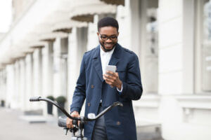 Happy GoReminders customer using GoReminders on his phone. 